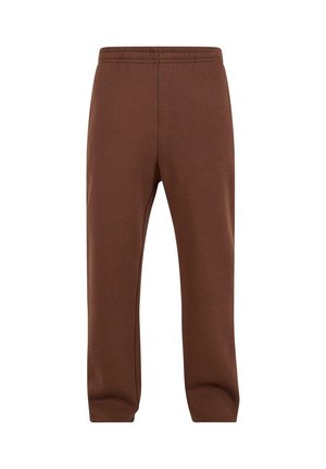 Brown sweatpants with an elastic waistband, tapered legs, and a smooth texture. Features side pockets and a simple, unembellished design.