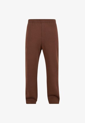 Hnedé teplákové nohavice s elastickým pásom, zúženými nohavicami a hladkou textúrou. Obsahujú bočné vrecká a jednoduchý, nezdobený dizajn.
