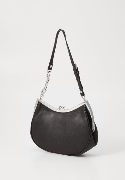 Black leather shoulder bag with silver frame and clasp, adjustable strap with buckle and detachable metal clip.