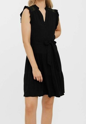 Black dress with short ruffled sleeves, v-neckline, waist tie, and tiered skirt. Made from lightweight fabric with lace detailing at shoulders.