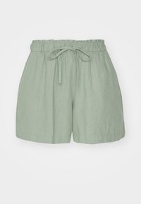 Light green linen shorts with an elastic waistband, adjustable drawstring, and relaxed fit. Features a smooth texture and no pockets.