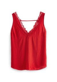 Punainen camisole, jossa on V-pääntie, pitsireunus ja herkkä aaltoileva helma. Materiaali on sileää ja siinä on säädettävät olkaimet.