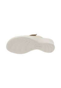 Suola di una scarpa realizzata in materiale in gomma beige texturizzato, presenta una superficie liscia e linee curve per una maggiore aderenza. L'etichetta indica la taglia 37.