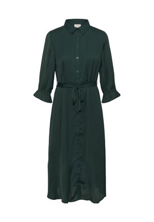 Tumši zaļa, pogājama kleita ar apkakli, trīs ceturtdaļu piedurknēm un viļņotiem aprocēm. Tam ir josta vidukļa apvidū un gluda auduma struktūra.