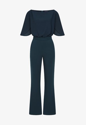 Jumpsuit blu navy con top fluido a spalle scoperte e pantaloni a gamba larga. Realizzato in tessuto leggero con una superficie liscia. Dettaglio con zip sul retro.
