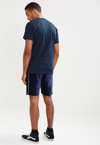 Vans Triko s potiskem - navy/white