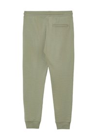 Hellgrüne Sweatpants mit elastischem Bund, schmal zulaufenden Beinen und einer einzigen Gesäßtasche. Aus weichem, strukturiertem Material gefertigt.