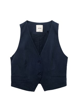 Gilet bleu marine en tissu texturé, avec un col en V, deux poches avant et une fermeture à deux boutons. Étiquette visible à l'intérieur du col.