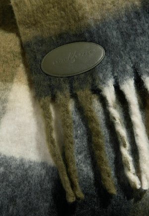 Šal iz volnene mešanice v odtenkih zelene, sive in smetane s resicami na robovih. Ima teksturiran usnjen pečat z blagovno znamko "Love & Roses".