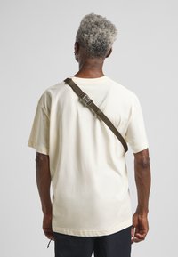 Jack Wolfskin Sac banane - mineral red