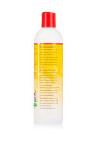 White plastic bottle of Control Wig Shampoo with a red cap. Features yellow label with black and white text detailing usage instructions and warnings.