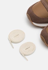 saucony jazz homme marron