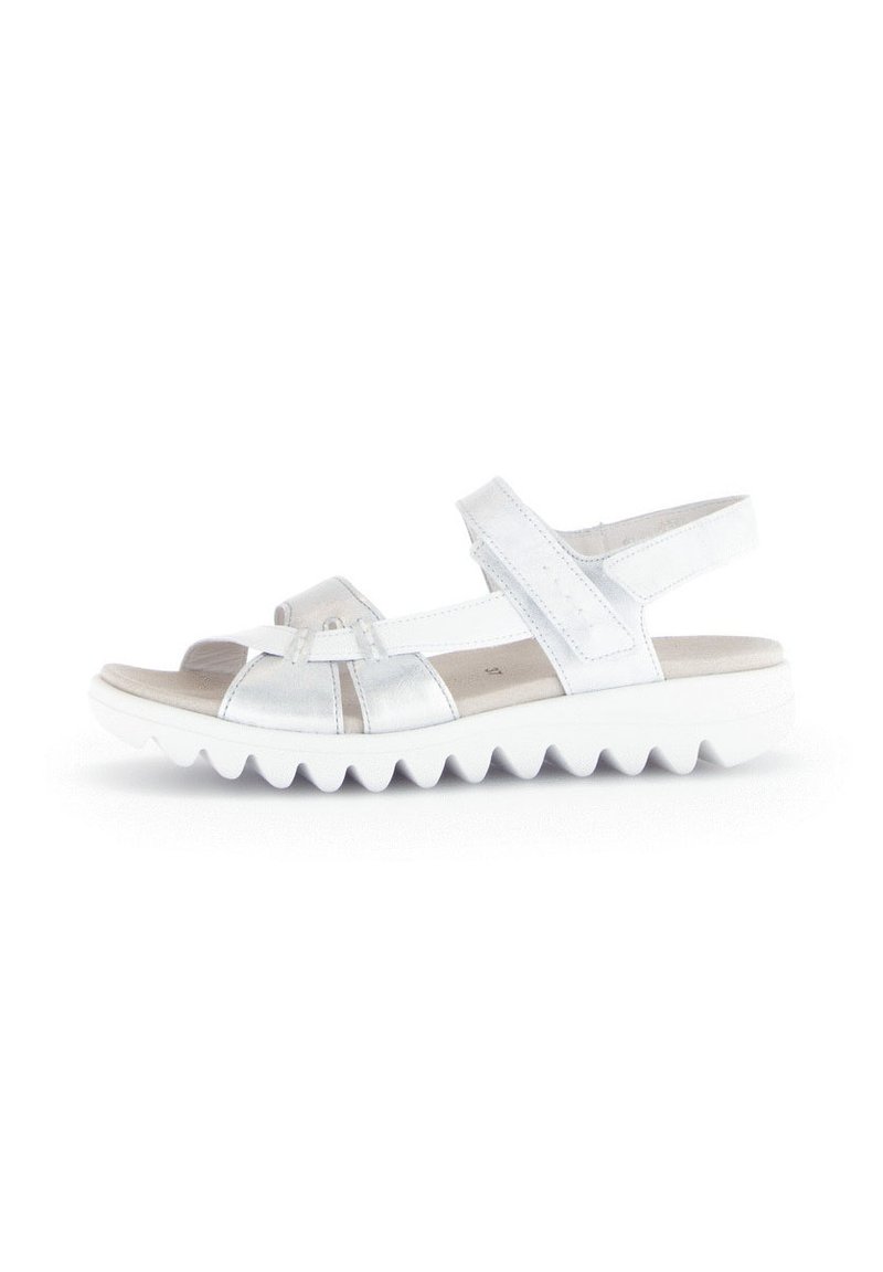 Zilveren leren sandalen met een gelaagde witte zool, verstelbare riempjes en een textuur in de binnenzool. Ontworpen voor comfort en ondersteuning.