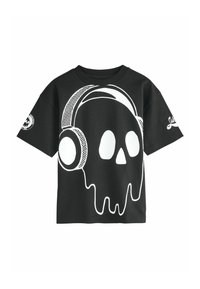 T-shirt nera con una grande grafica di teschio bianco con cuffie, design gocciolante e dettagli testurizzati sottili sulle maniche.