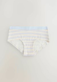 Culotte a righe con elastico azzurro chiaro in vita, righe pastello gialle e blu su sfondo bianco, morbido tessuto di cotone.
