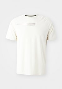 White short-sleeved T-shirt made of soft fabric with a crew neck, featuring a thin dark line and the "HUMMEL" logo in light gray on the chest.