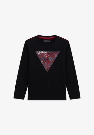 Black long-sleeve shirt featuring a triangular graphic with red and silver accents and the word "GUESS" in bold. Textured fabric with contrast stitching.