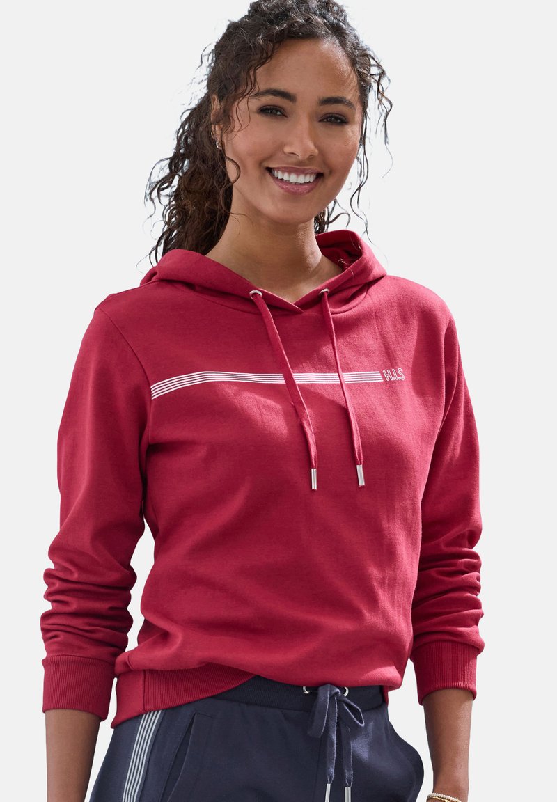 Red hooded sweatshirt made of soft fabric, featuring a white striped pattern across the chest, drawstrings, and ribbed cuffs.