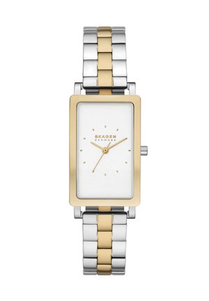 Rectangular silver and gold wristwatch with white dial, gold hour markers and hands, and two-tone metal link band, brand Skagen Denmark.