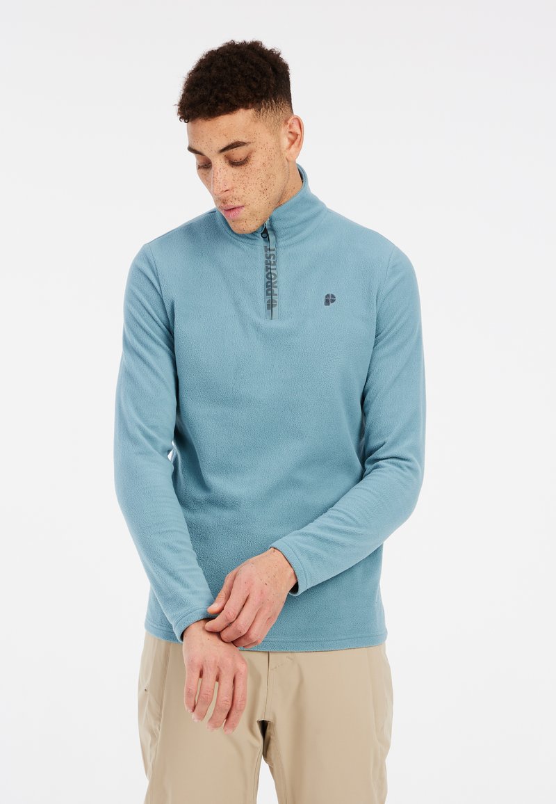 Pullover in pile azzurro chiaro con mezzo zip sul collo, maniche lunghe e tessuto testurizzato. Presenta un logo sul petto e polsini regolabili.