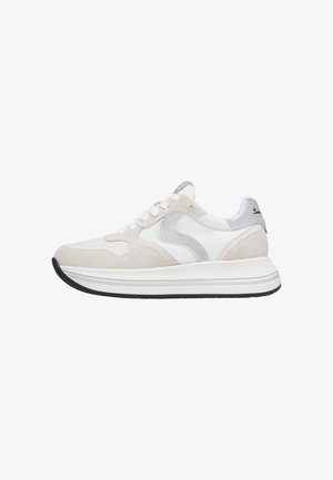 White and gray athletic shoes with suede and mesh materials, featuring a textured sole, laces, and a prominent logo detail on the side.