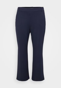 Granatowe, rozszerzane spodnie wykonane z gładkiego, elastycznego materiału. Posiadają dopasowany pas z elastycznym paskiem oraz czystą krawędź na dole.