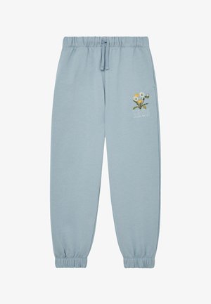Lyseblå joggingbukser med elastisk talje og manchetter, med blomster- og bi-broderi med ordet "REISS" på den øverste venstre ben.