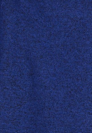 Tejido de punto en azul profundo, con una textura suave y ligera variación en la tonalidad, creando una apariencia suave y uniforme.