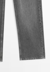 Bottom portion of straight-leg gray denim jeans with visible stitching on a white background.