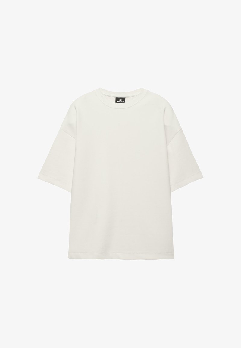 Weißes, übergroßes T-Shirt mit kurzen Ärmeln und rundem Halsausschnitt, schlichtes Design und leicht abgesenkte Schulternähte.