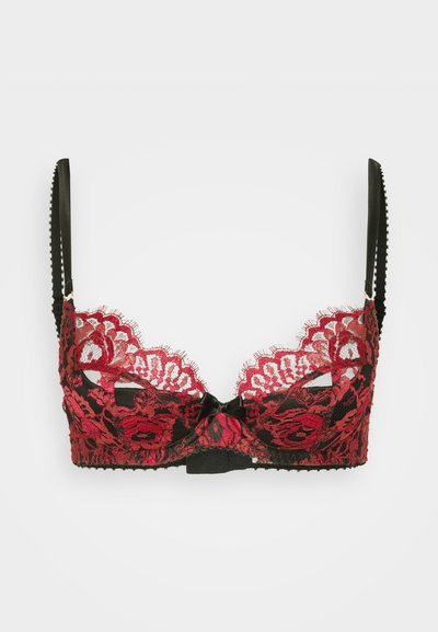 Sutiã de renda preta e vermelha com padrão floral, alças ajustáveis pretas e um pequeno laço preto no fecho frontal.
