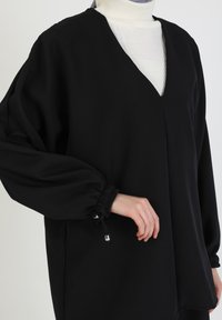 Modanisa SET - A-snit nederdel - black