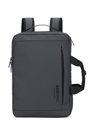 Zaino rettangolare grigio scuro con cerniera verticale anteriore, spallacci imbottiti, maniglia laterale e logo "AOKING BACKPACK" sul davanti.