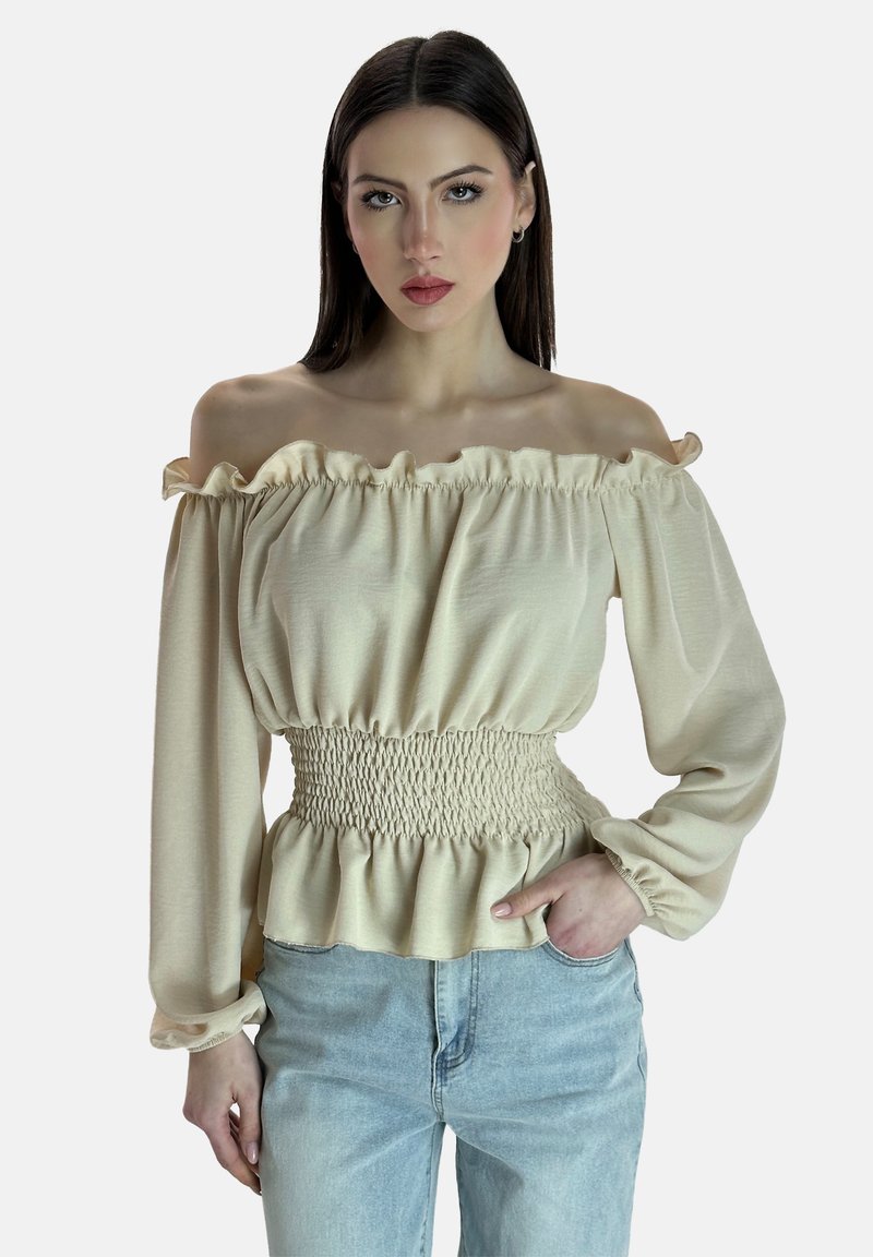 Beige Off-Shoulder-Bluse mit Rüschenausschnitt und langen Ärmeln, mit gerafftem Taillenbund und lockerer Passform, aus leichtem Material gefertigt.