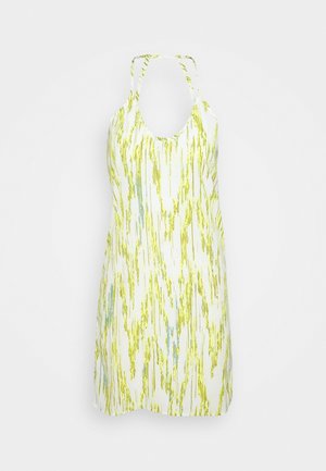 Mekko ilman hihoja, jossa on matala kaula-aukko. Valkoisella pohjalla on kirkas keltainen ja sininen abstrakti kuvio.