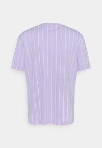 Light purple t-shirt featuring white vertical stripes, short sleeves, and a round neck. Soft cotton material with a smooth texture.
