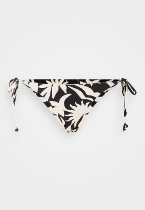 Czarno-białe bikini z tropikalnym wzorem liści, z wiązaniami po bokach, na jednolitym białym tle.