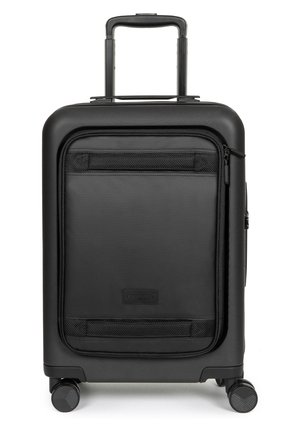 Black hard-shell suitcase with a retractable handle, front zipper pocket, and four wheels. Smooth texture with subtle logo detail.