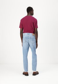Tommy Jeans ISAAC - Džínsy voľného strihu - denim light