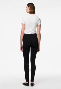 Pieces PCHIGH NOOS - Jeggings - black