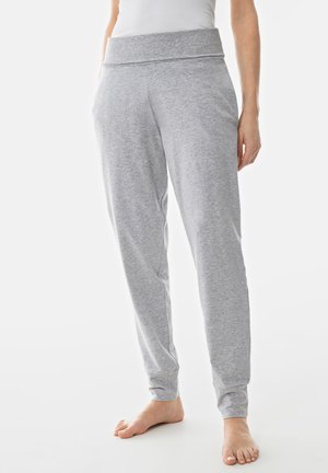 Pantaloni della tuta grigi con una ampia vita a costine, polsini a gamba affusolata e una texture morbida. Progettati per comfort e abbigliamento casual.