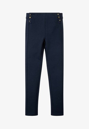 Pantalon bleu marine taille haute à jambes slim, doté de deux pattes latérales avec des boutons dorés près de la ceinture.