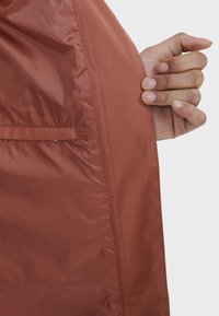 Aigle Vodotesná bunda - red