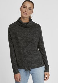 Maglione leggero di un grigio scuro con collo a cowl e orlo con coulisse. Maniche lunghe e vestibilità leggermente ampia, caratterizzato da un motivo testurizzato.