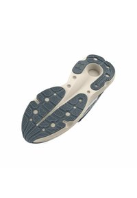 Semelle de chaussure présentant un design bicolore : beige et gris foncé avec des motifs texturés pour l'adhérence, incluant des indentations circulaires et linéaires.