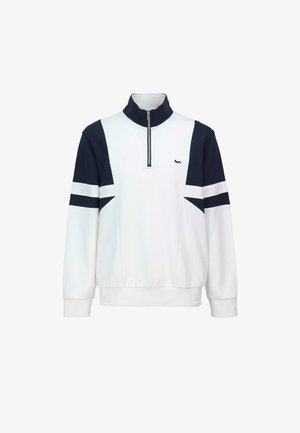 Biała bluza z zamkiem do ćwierć długości, granatowe ramiona, mankiety i paski na rękawach, z małym logo psa na piersi.