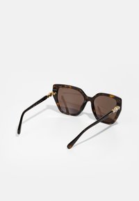 Swarovski Solbriller - dark havana/dark brown