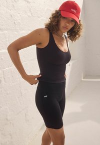 Self. Leggingsit - black