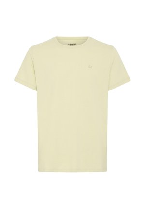 Béžové tričko s krátkým rukávem, kulatým výstřihem a malým jemným logem na levé straně hrudi, jednoduchý design, standardní střih.