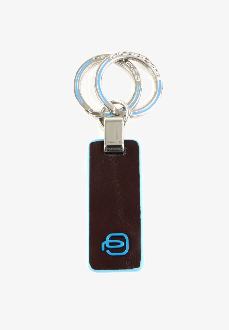 Leather keychain in dark brown with light blue trim. Features three silver key rings and a metal clasp with embossed logo detail.
